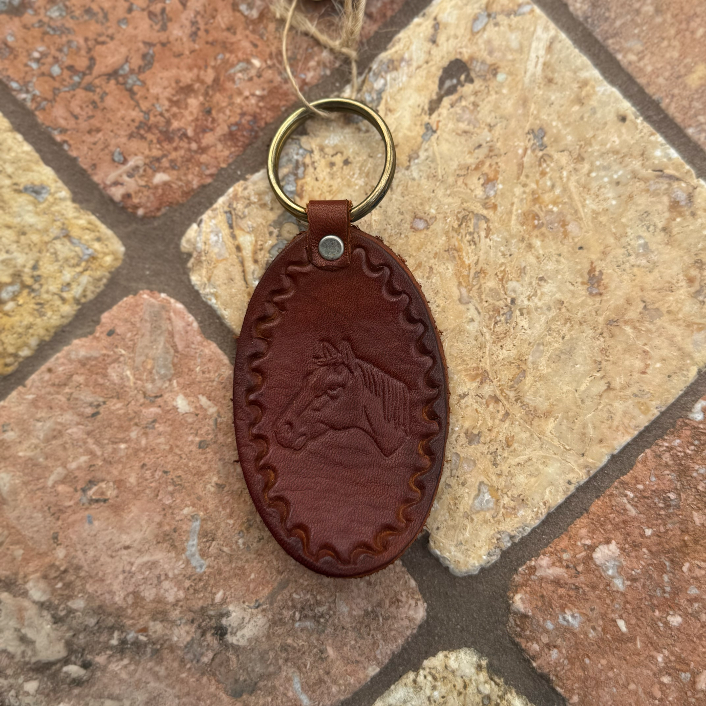 Handcrafted Leather Oval keychain | Horse, Eagle, Deer, Cowboy hat, and Horse head embedded options available | Hand stamped in Mexico