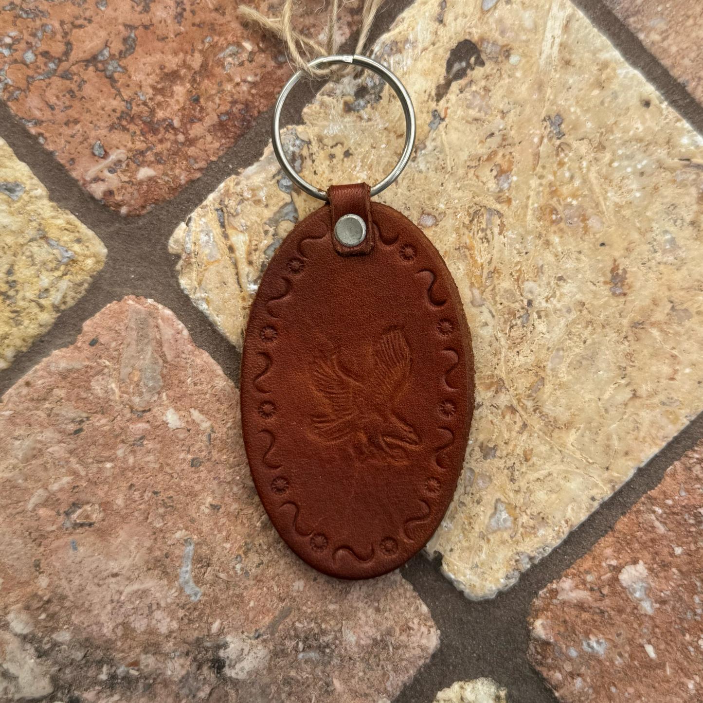 Handcrafted Leather Oval keychain | Horse, Eagle, Deer, Cowboy hat, and Horse head embedded options available | Hand stamped in Mexico