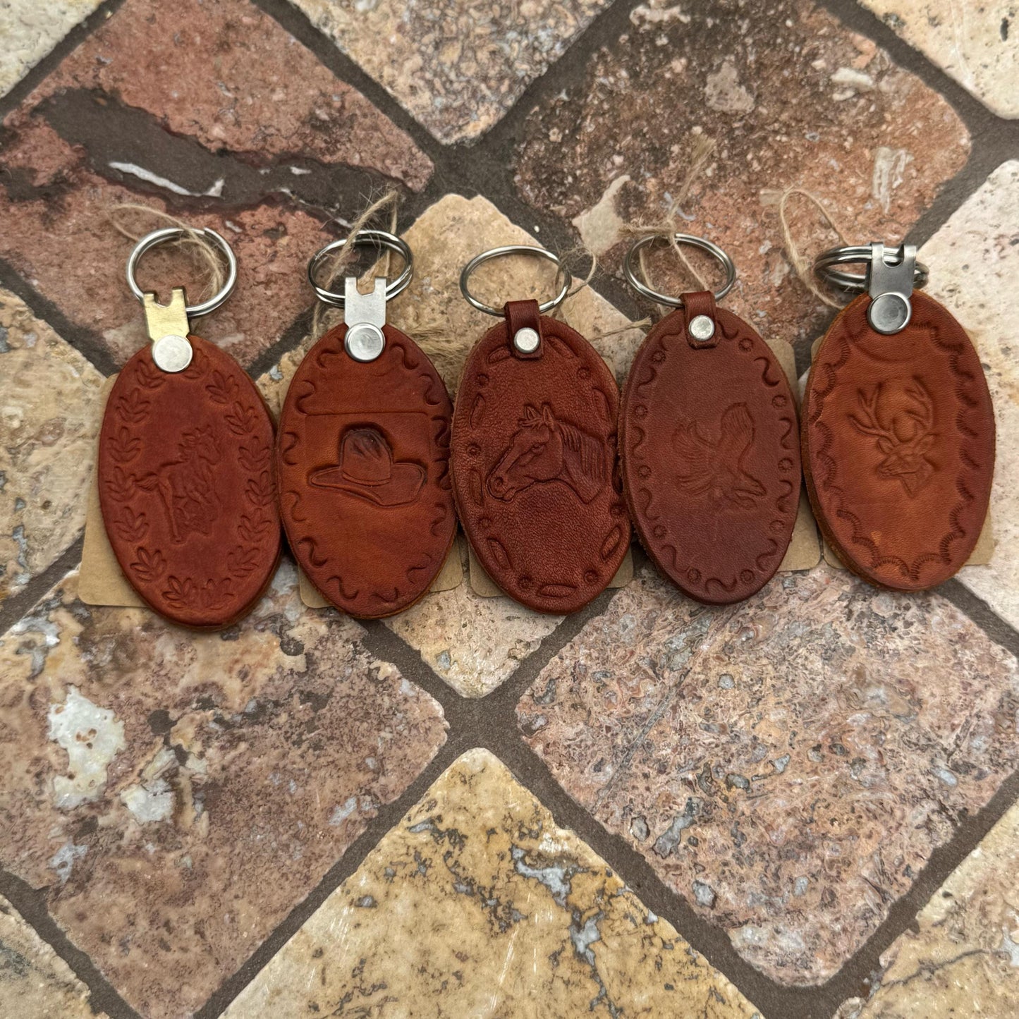 Handcrafted Leather Oval keychain | Horse, Eagle, Deer, Cowboy hat, and Horse head embedded options available | Hand stamped in Mexico