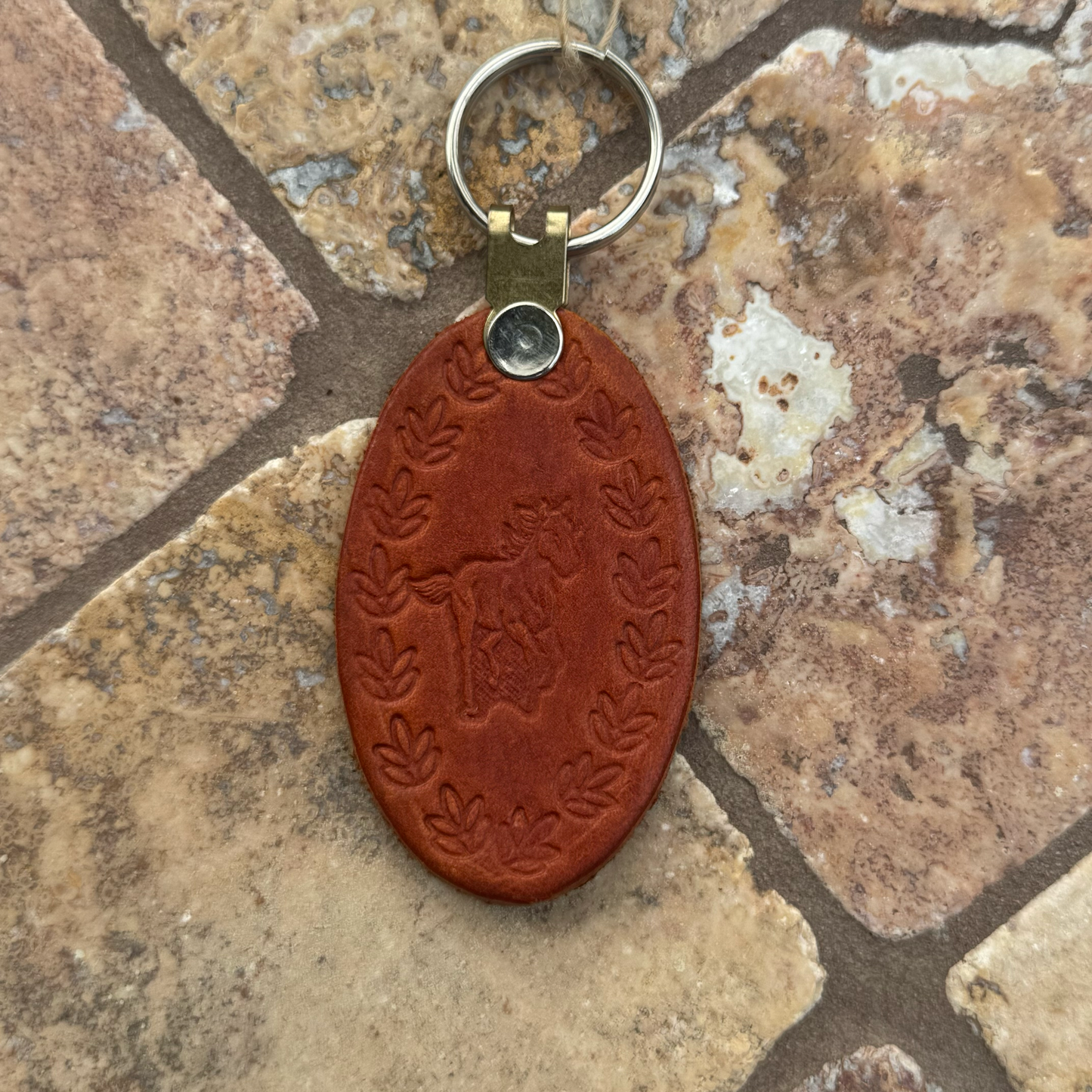 Handcrafted Leather Oval keychain | Horse, Eagle, Deer, Cowboy hat, and Horse head embedded options available | Hand stamped in Mexico