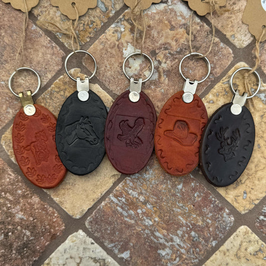 Handcrafted Leather Oval keychain | Horse, Eagle, Deer, Cowboy hat, and Horse head embedded options available | Hand stamped in Mexico