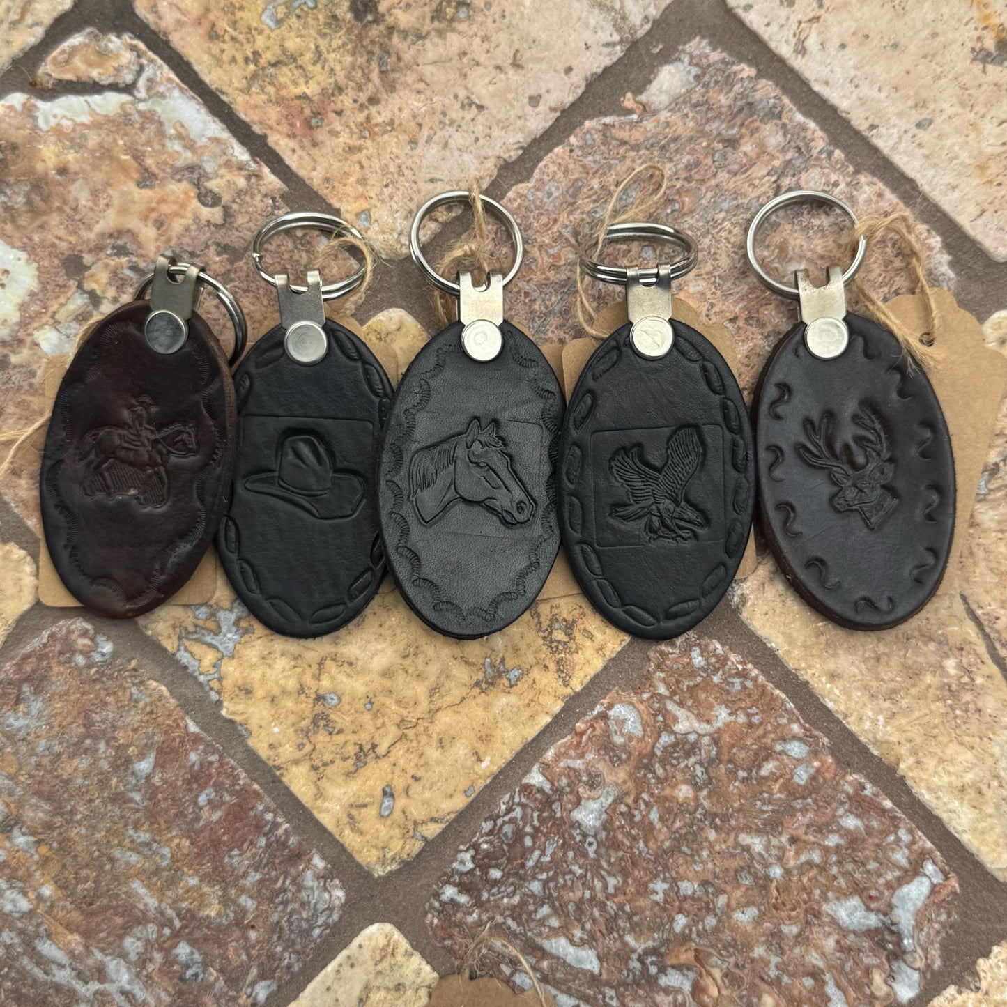 Handcrafted Leather Oval keychain | Horse, Eagle, Deer, Cowboy hat, and Horse head embedded options available | Hand stamped in Mexico